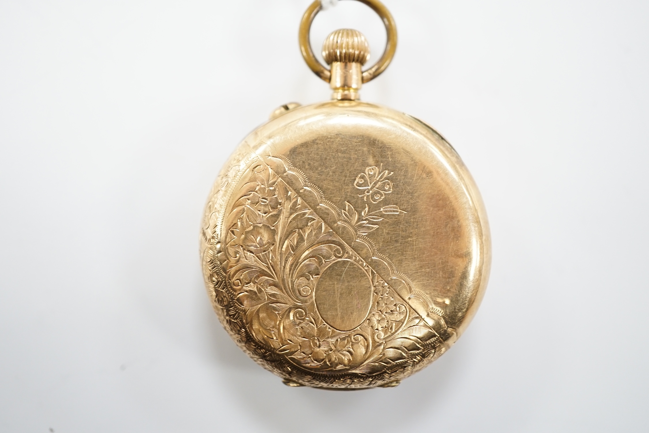 A continental 14k open face keyless fob watch, with Roman dial